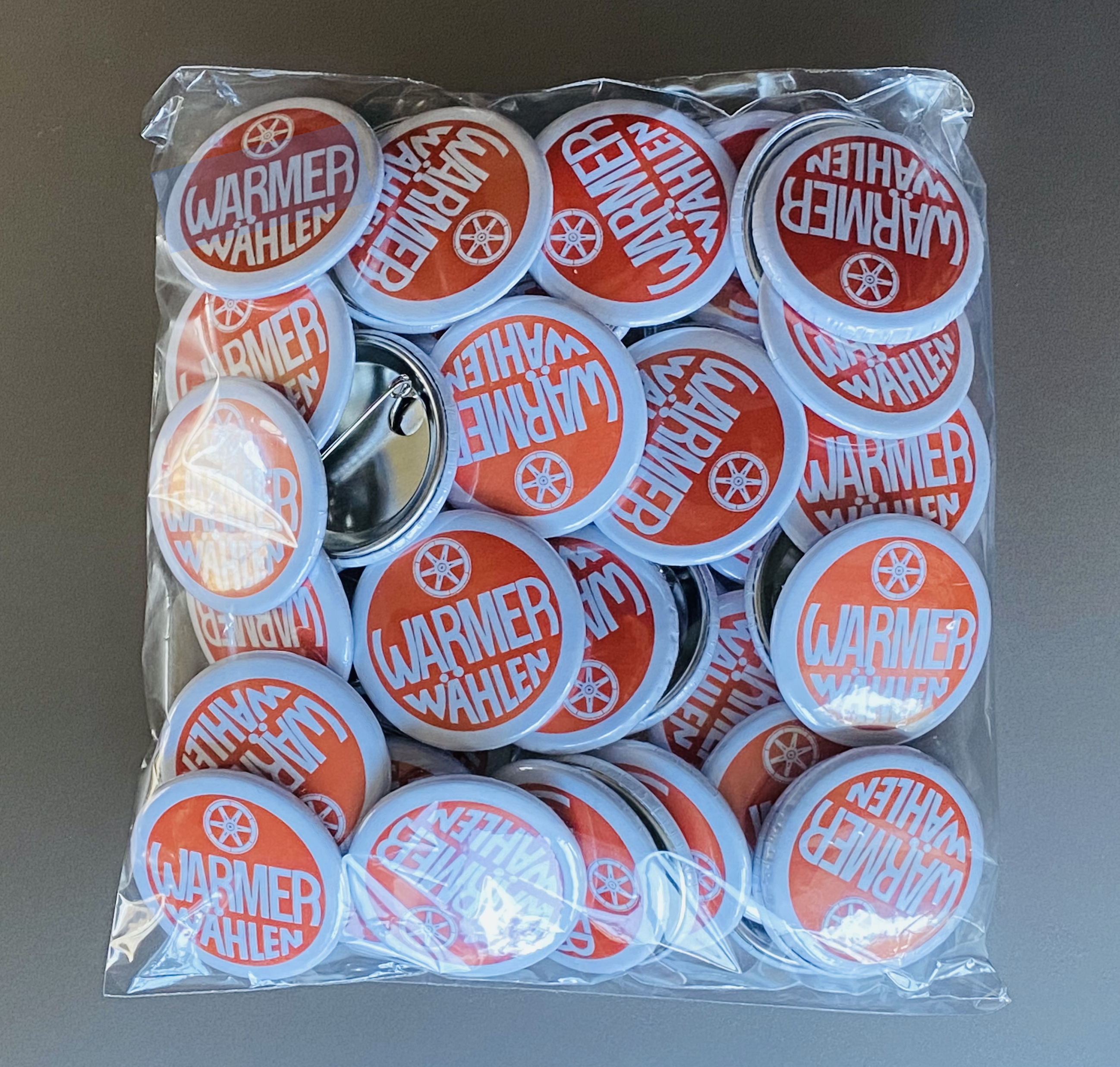 Button "WARMER WÄHLEN"